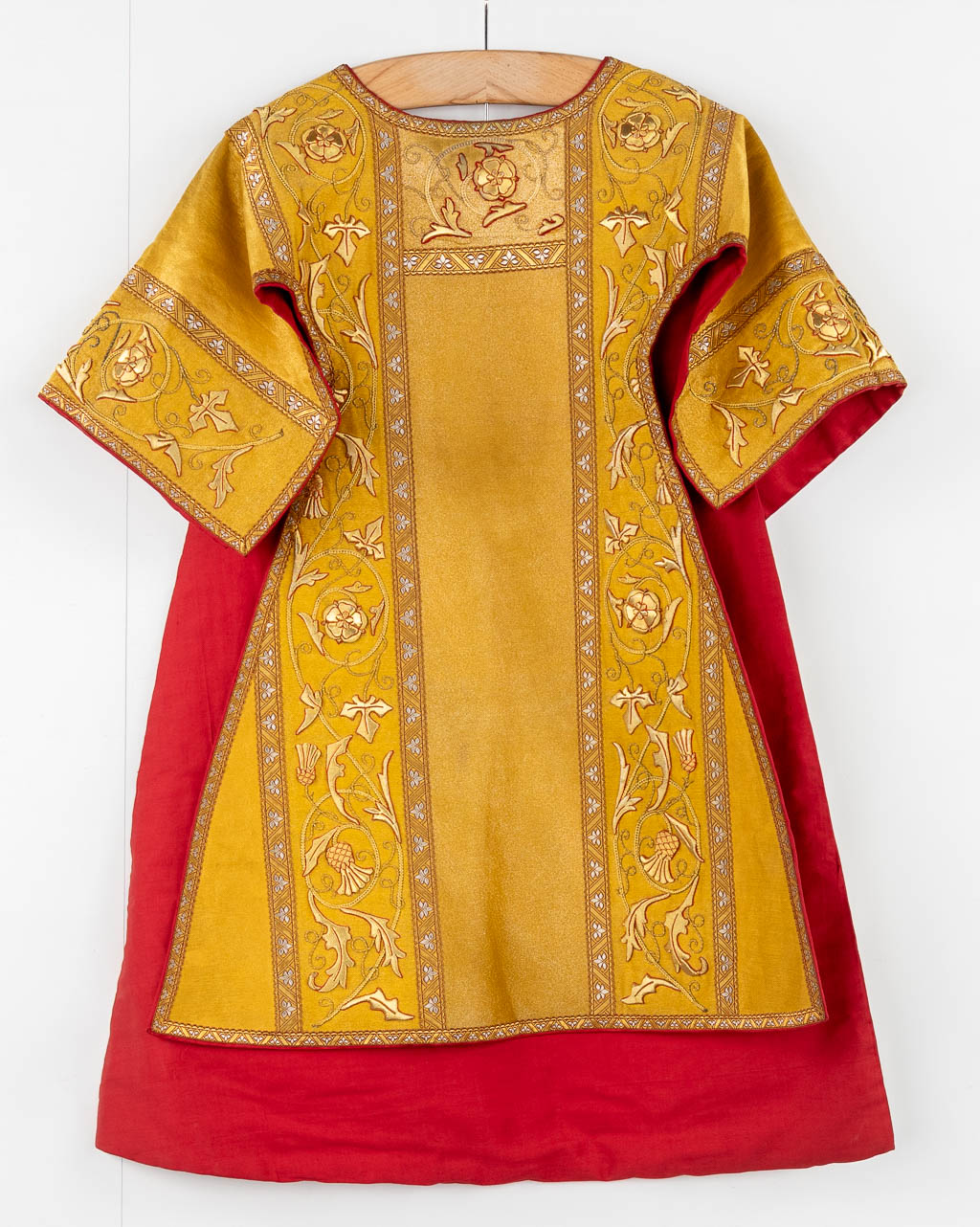 Two Dalmatics, Roman Chasuble, Chalice Veil and Stola, thick gold thread embroideries with floral decor.