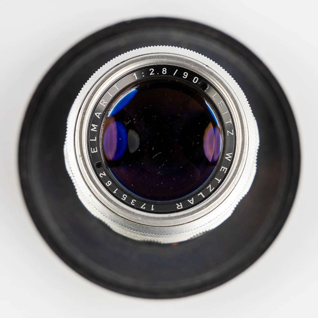 Leica, vier lenzen, en twee filters. (H:15,5 cm)