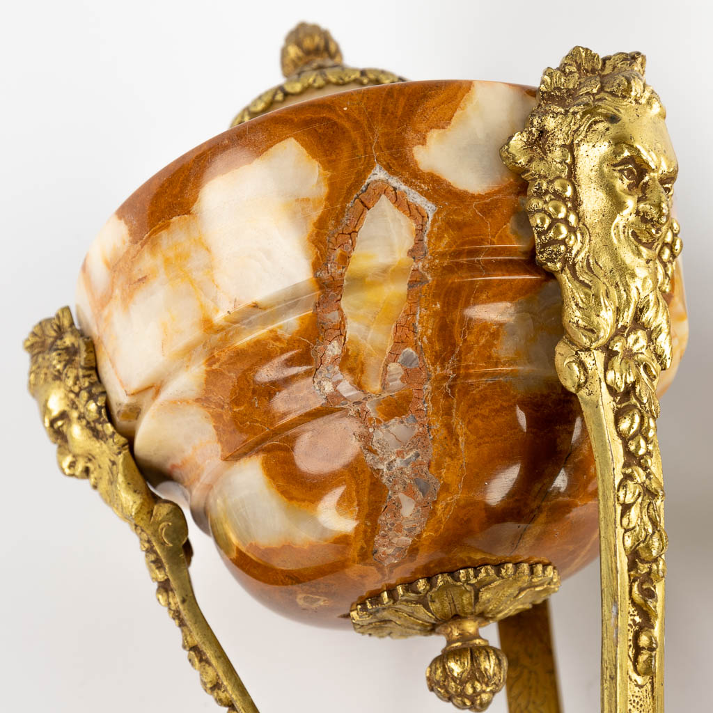 A pair of cassolettes, onyx mounted with bronze in Louis XVI style. Circa 1900. (H:45 x D:18 cm)