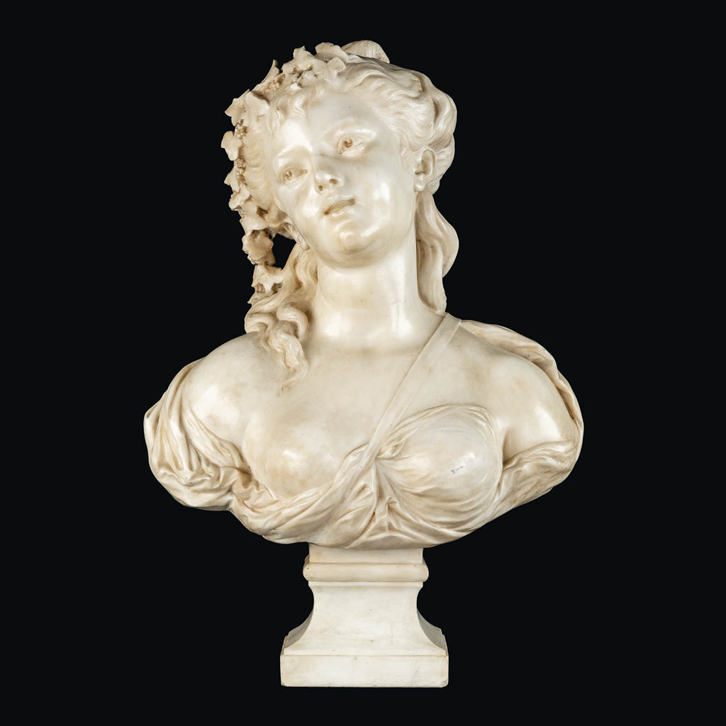 An elegant bust of a half-naked lady, sculptured marble. 19th C. (L:26 x W:45 x H:64 cm)