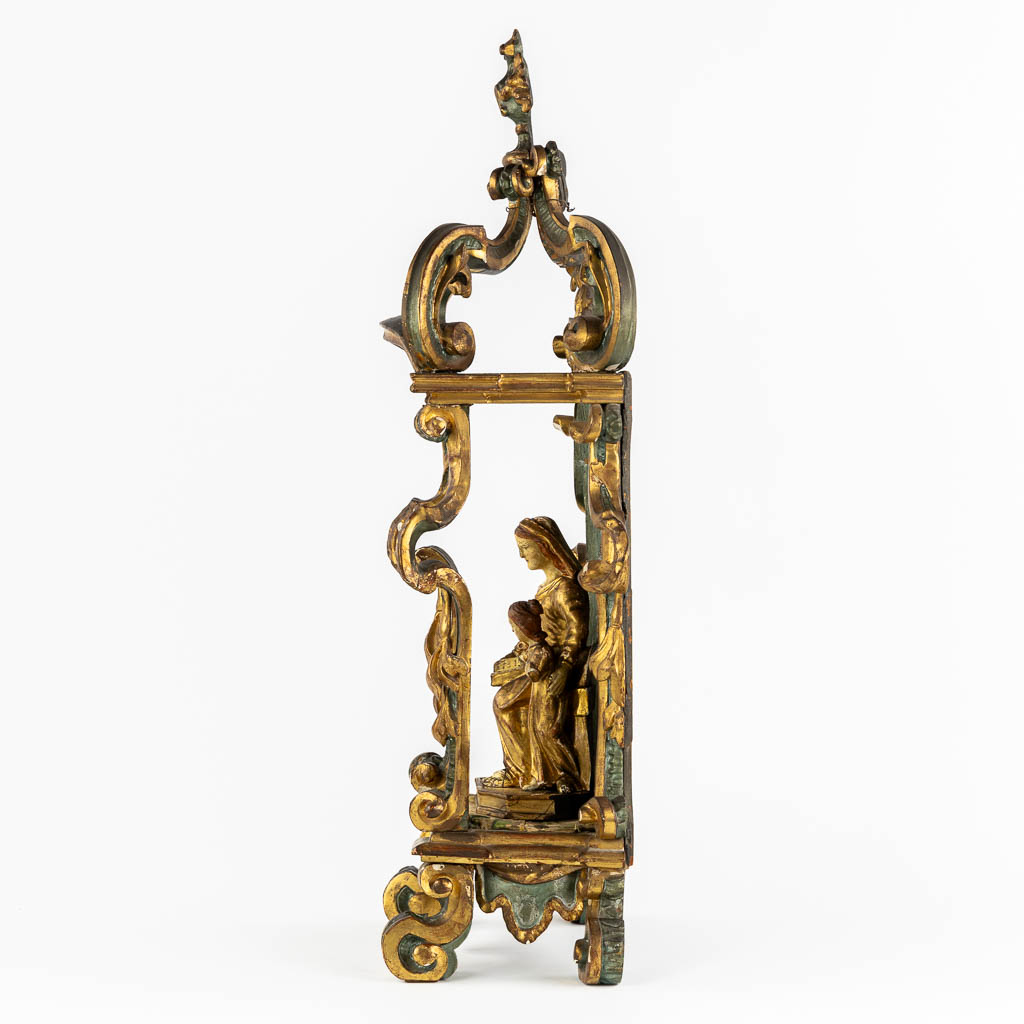 A Baroque Shrine and Madonna with Child. Sculptured, gilt and patanated wood. 18th C. (L:18 x W:31 x H:70 cm)