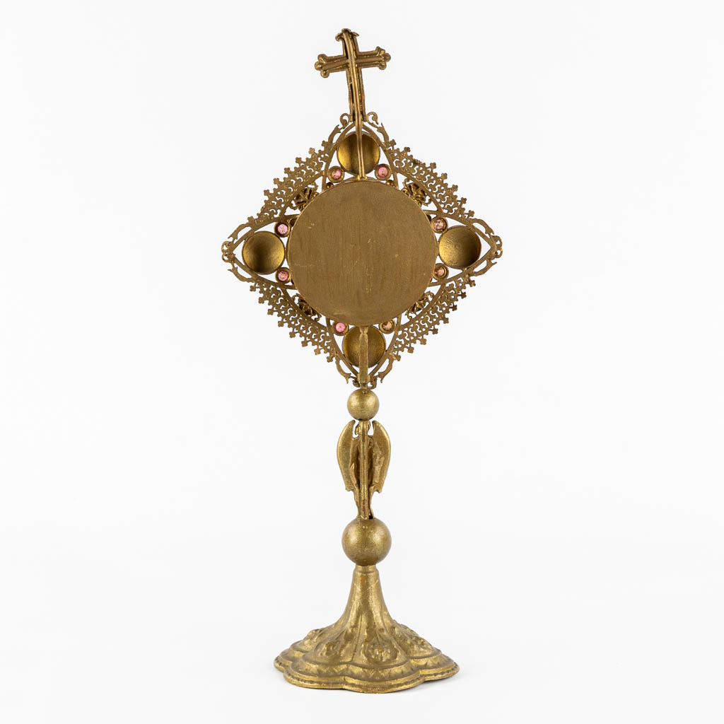 A reliquary monstrance with 6 relics, spelter and cloisonné enamel. 1901. (W:16 x H:36 cm)