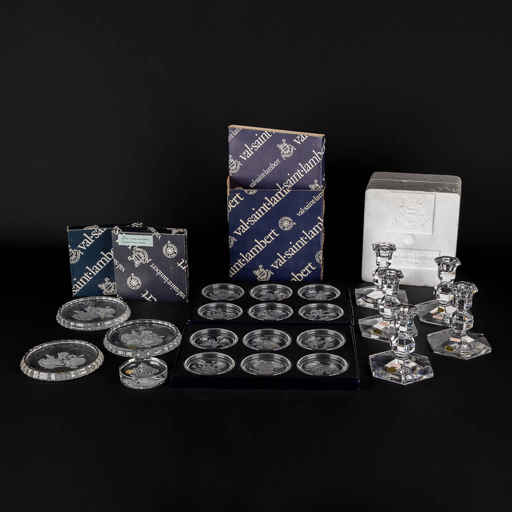 Val Saint Lambert, bottle and glass coasters, 5 candlesticks and a paperweight. (H:12,5 x D:10,7 cm)