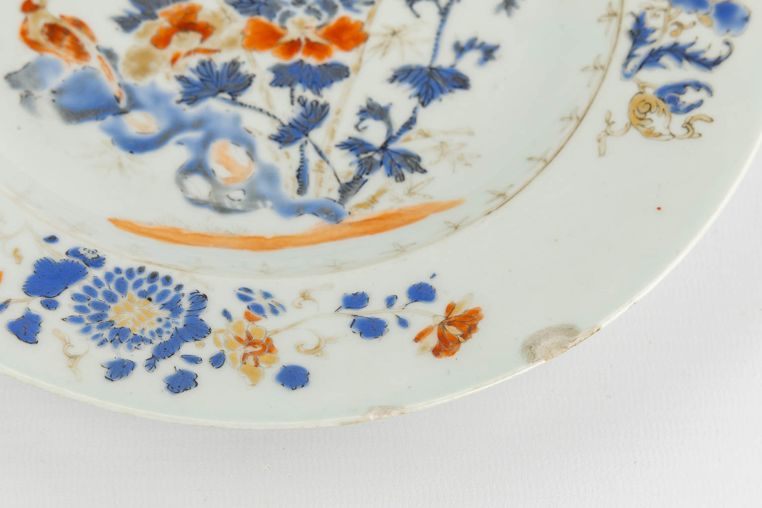 Twelve Chinese Famille Rose and Blue-white plates and bowls. 19th/20th C. (D:29 cm)