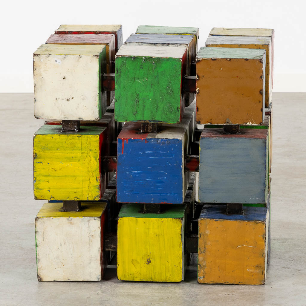 A mid-century side table in the shape of a Rubik's Cube 