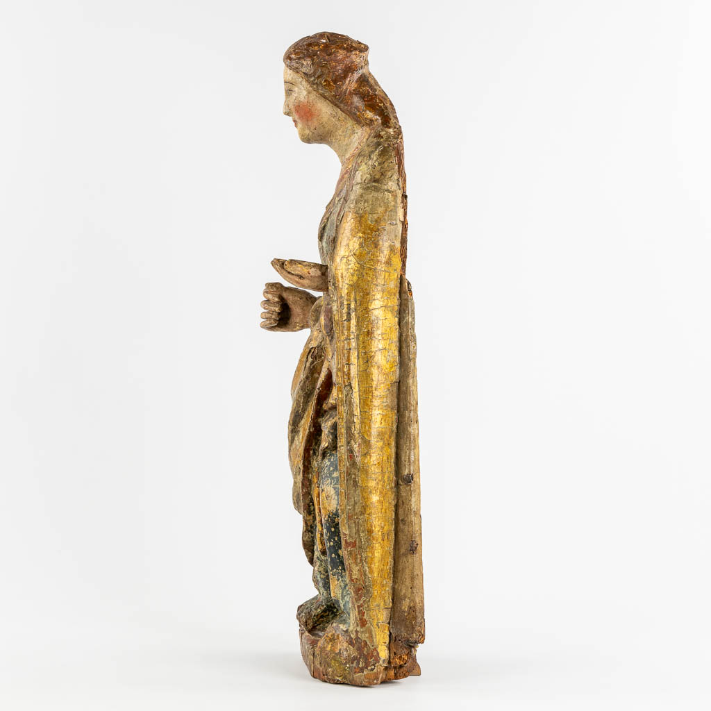 An antique wood sculptured figurine of a saint, polychrome, 14th C. (W:27 x H:78 cm)