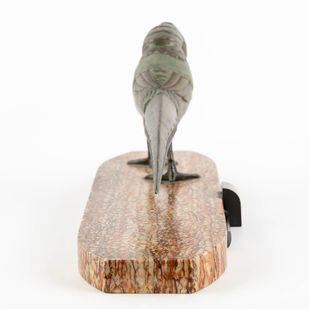 A figurine of a Pheasant, in the style of Rochard. Spelter. Art Deco. (L:16 x W:56 x H:20,5 cm)