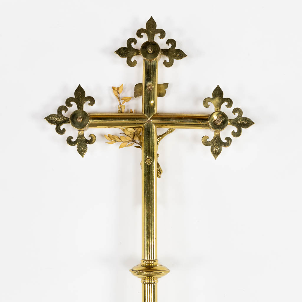 A bronze processional crucifix, richly decorated with cabochons. (W:33 x H:59 cm)