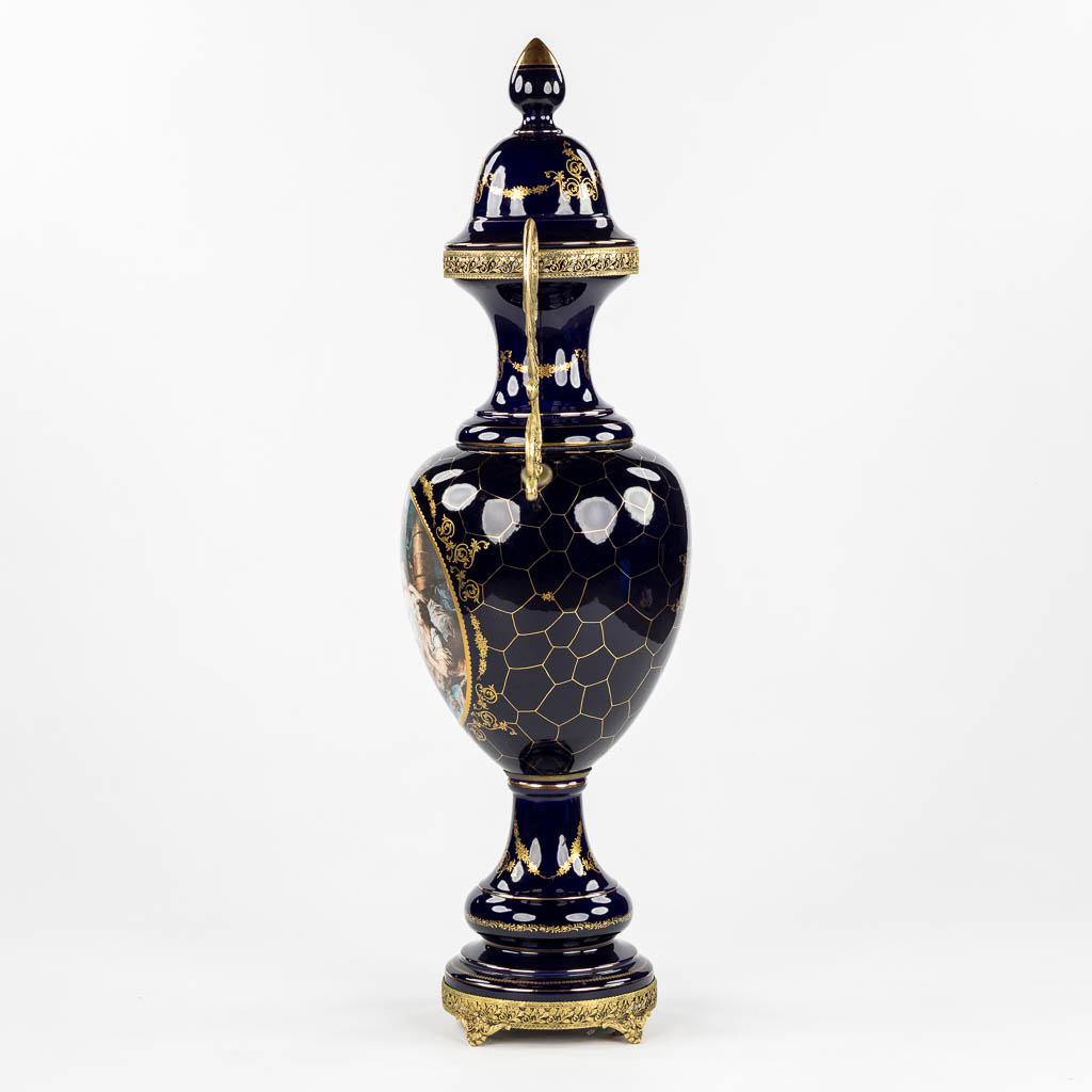 A decorative cobalt blue vase mounted with bronze, in the style of Sèvres. 20th C. (L:30 x W:42 x H:110 cm)