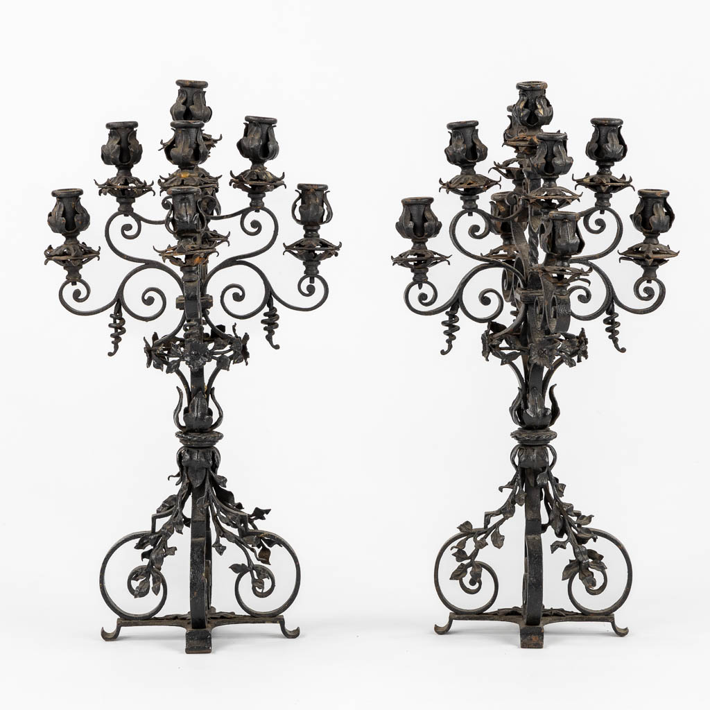 A pair of wrought-iron candelabra. Circa 1900. (L:31 x W:31 x H:57 cm)