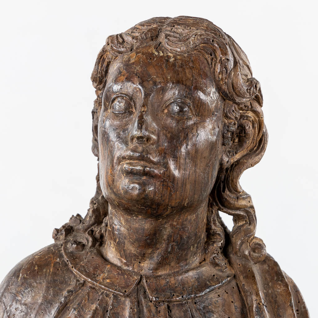 Flemish school, a wood-sculptured figurine of Saint John. 15th C. (L:26 x W:37 x H:105 cm)