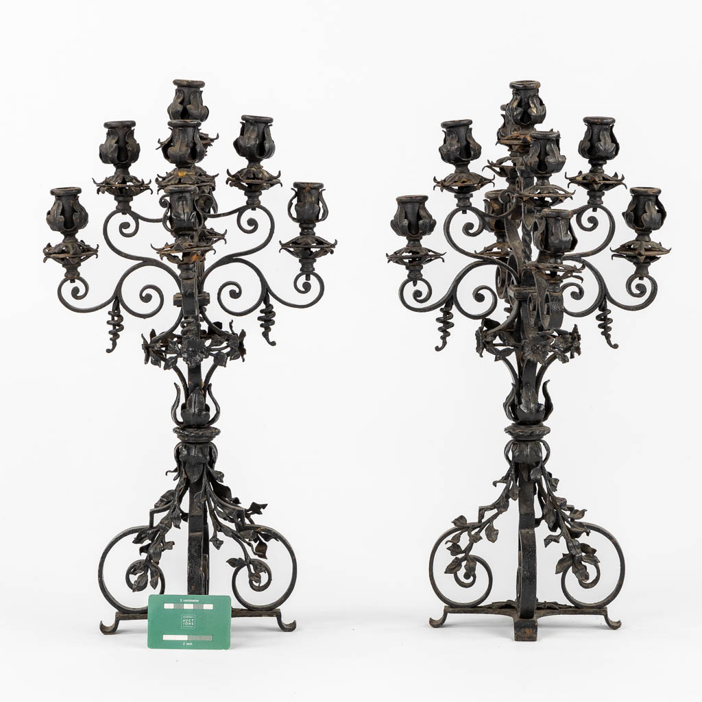 A pair of wrought-iron candelabra. Circa 1900. (L:31 x W:31 x H:57 cm)