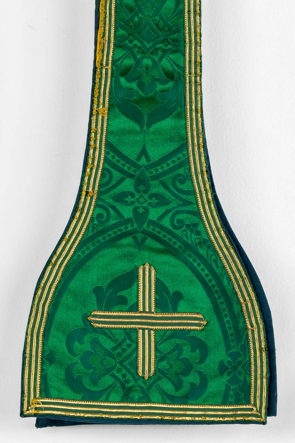 Two Dalmatics and a Roman Chasuble, added are a big collection of stola and maniple. 