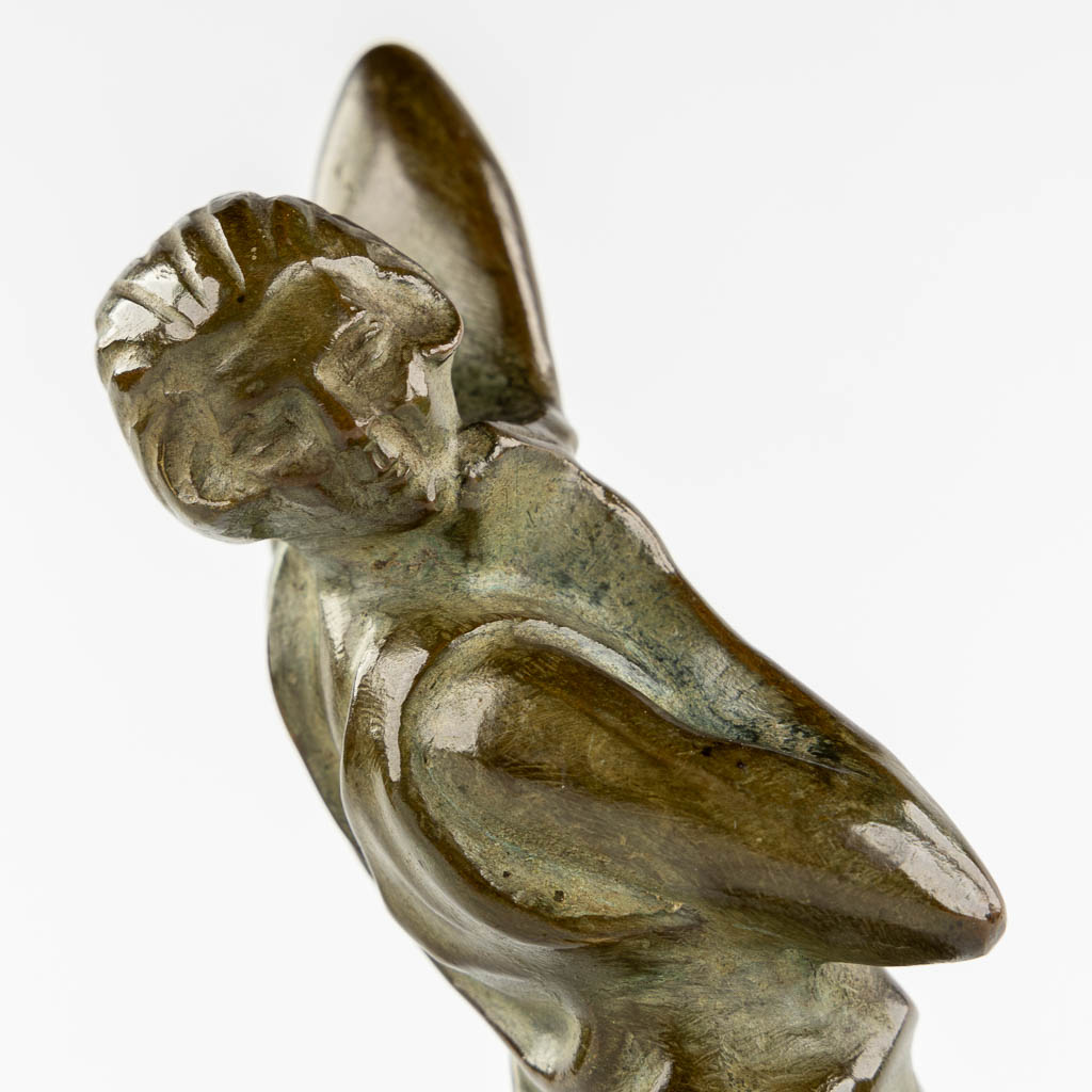 A figurine of a leaning lady, patinated bronze. Art deco. (H:27 cm)