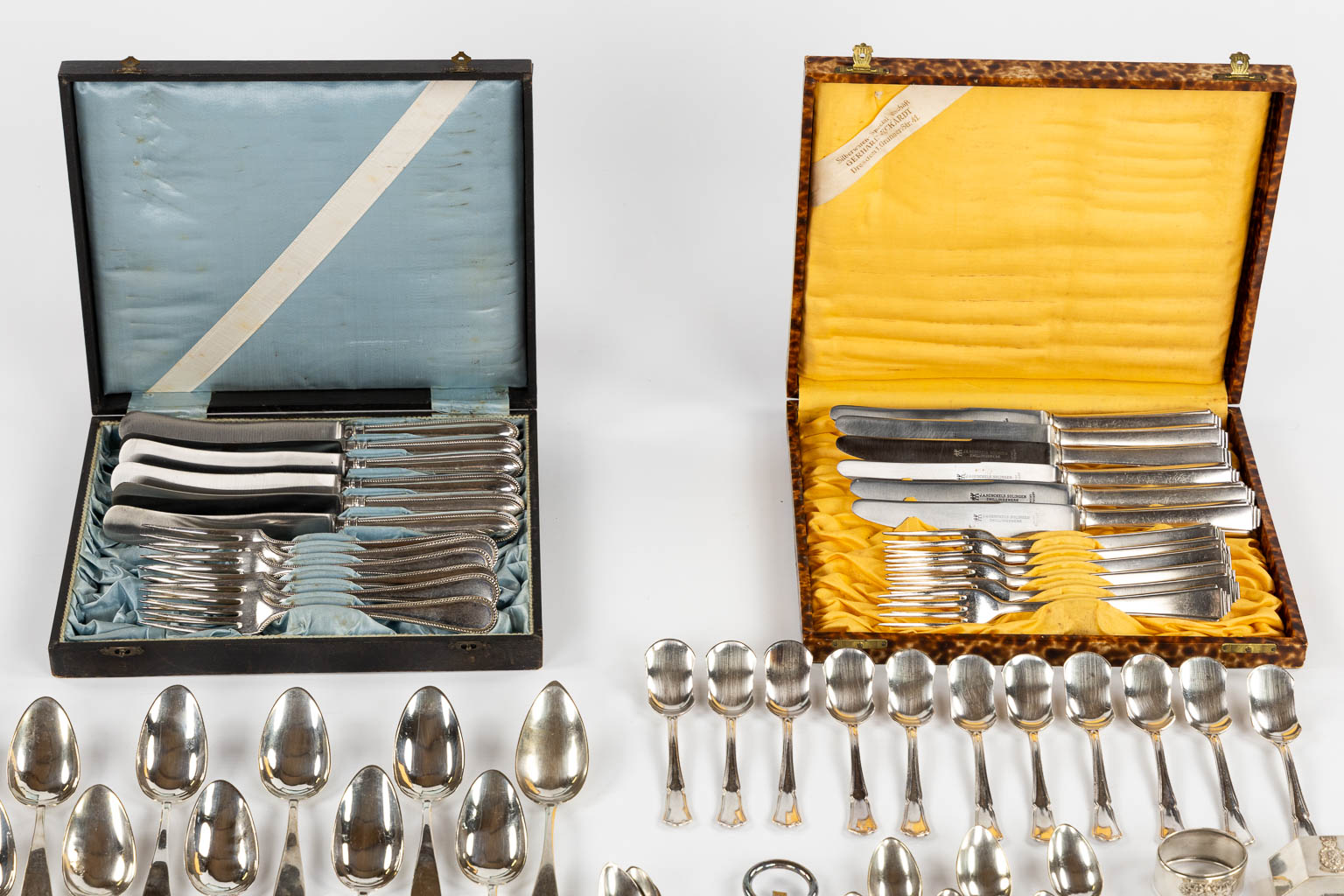 A large collection of silver and silver-plated cutlery. 