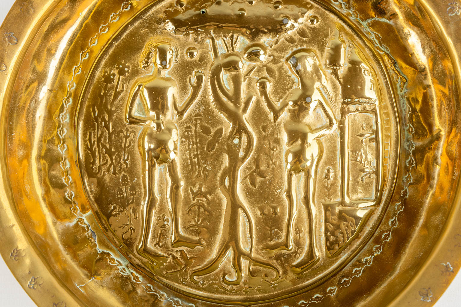 An antique Baptismal bowl, brass depicting 