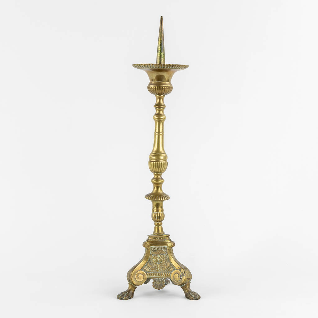 An antique candlestick, finished with putti, 18th C. (H:54 cm)