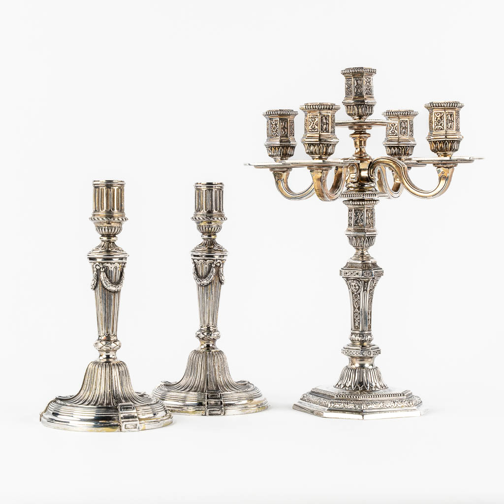 Christofle 'Duperier' a large candelabra, added are a pair of Candlesticks in Louis XVI style.