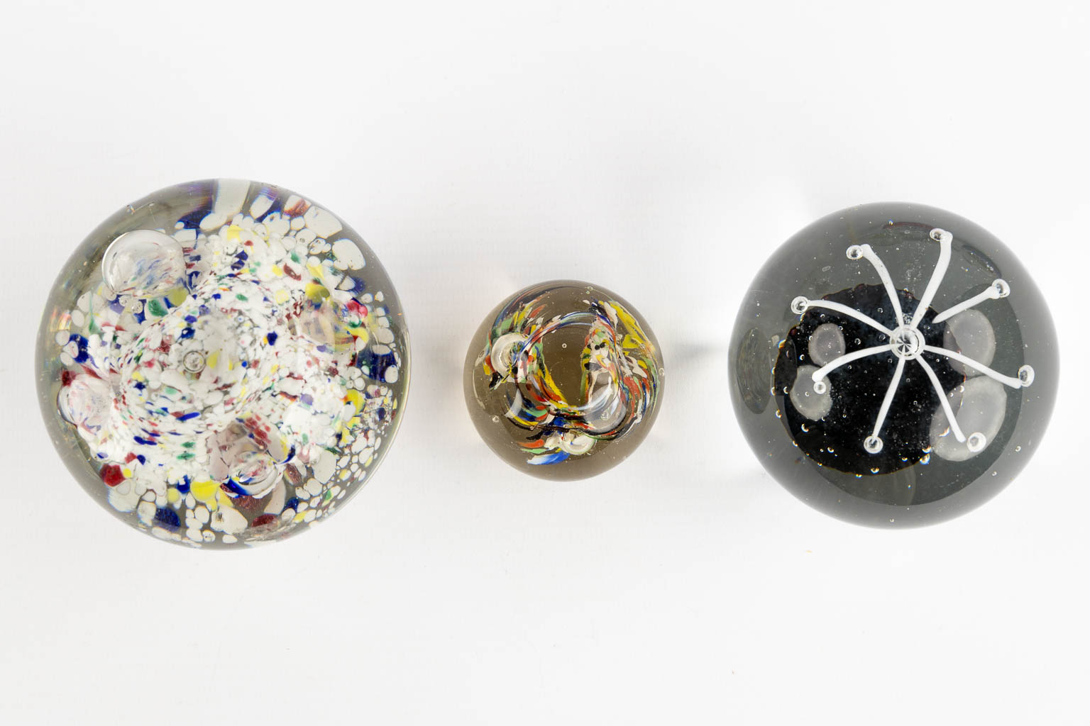 Louis Leloup, John Derian, Rock Crystal, a collection of 13 paperweights. (H:15 cm)