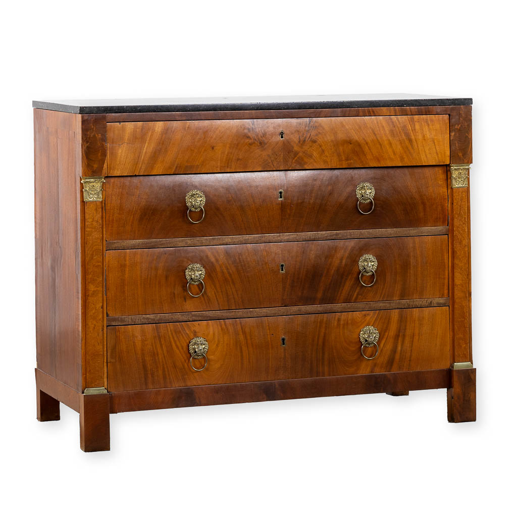 A four-drawer commode mounted with gilt bronze and a marble top, Empire. (L:53 x W:125 x H:98 cm)