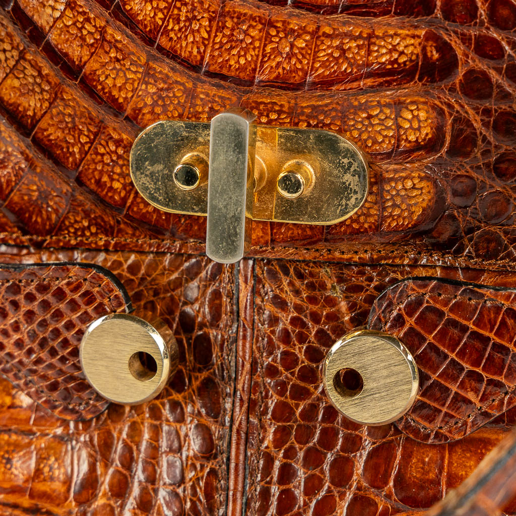 A vintage handbag, crocodile leather and gold-plated hardware. 