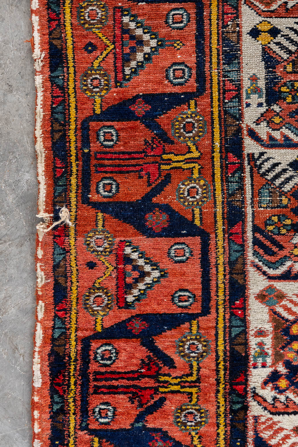 A Geometric Oriental hand-made carpet. (L:192 x W:157 cm)