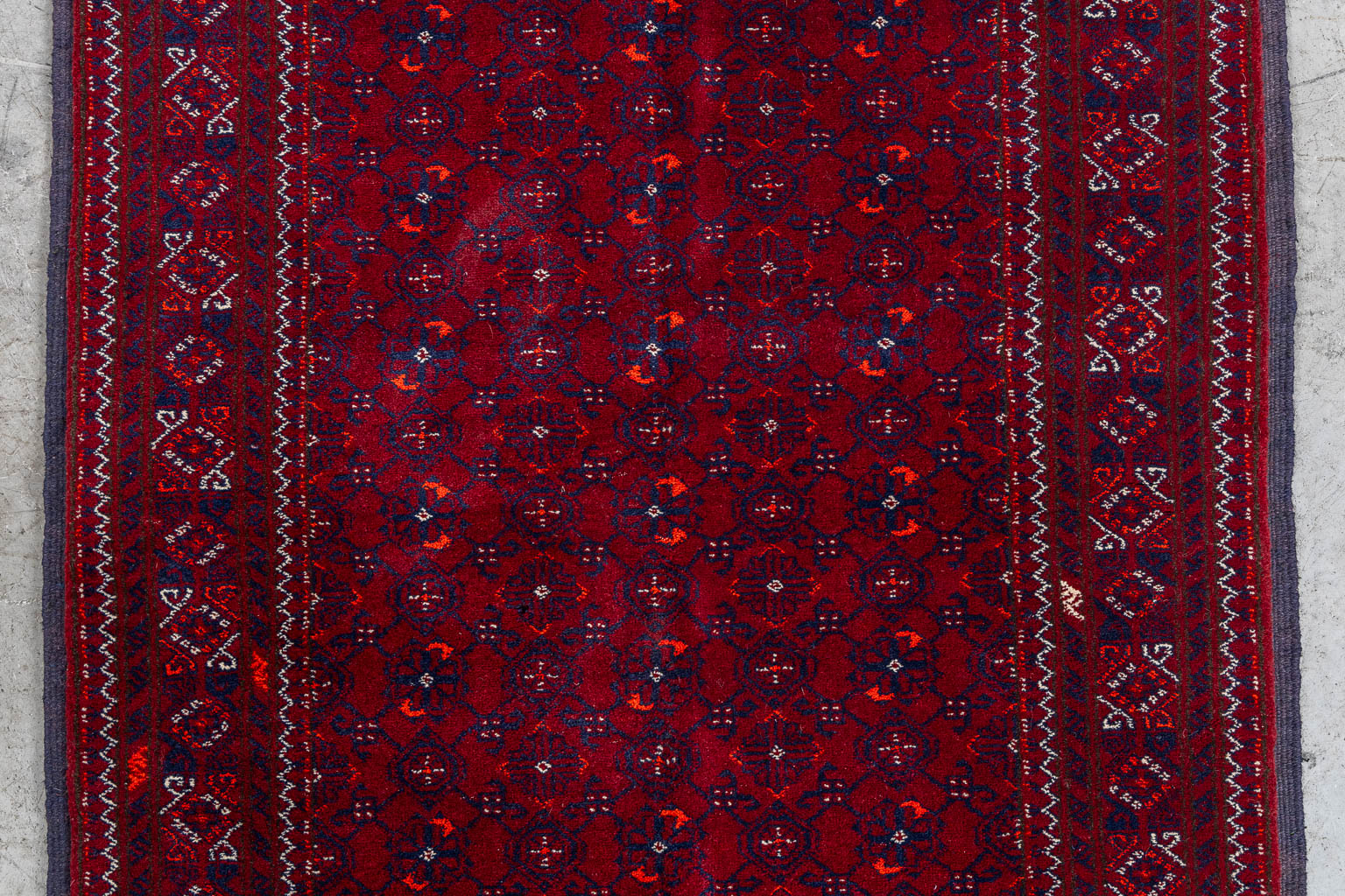 An Oriental hand-made runner, Afghan. (L:391 x W:85 cm)