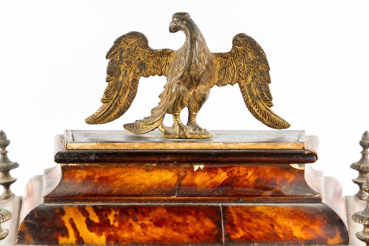 An antique Sicilian mantle clock, mounted with tortoiseshell and gilt bronze. Italy, 18th C. (L:20 x W:36 x H:53 cm)