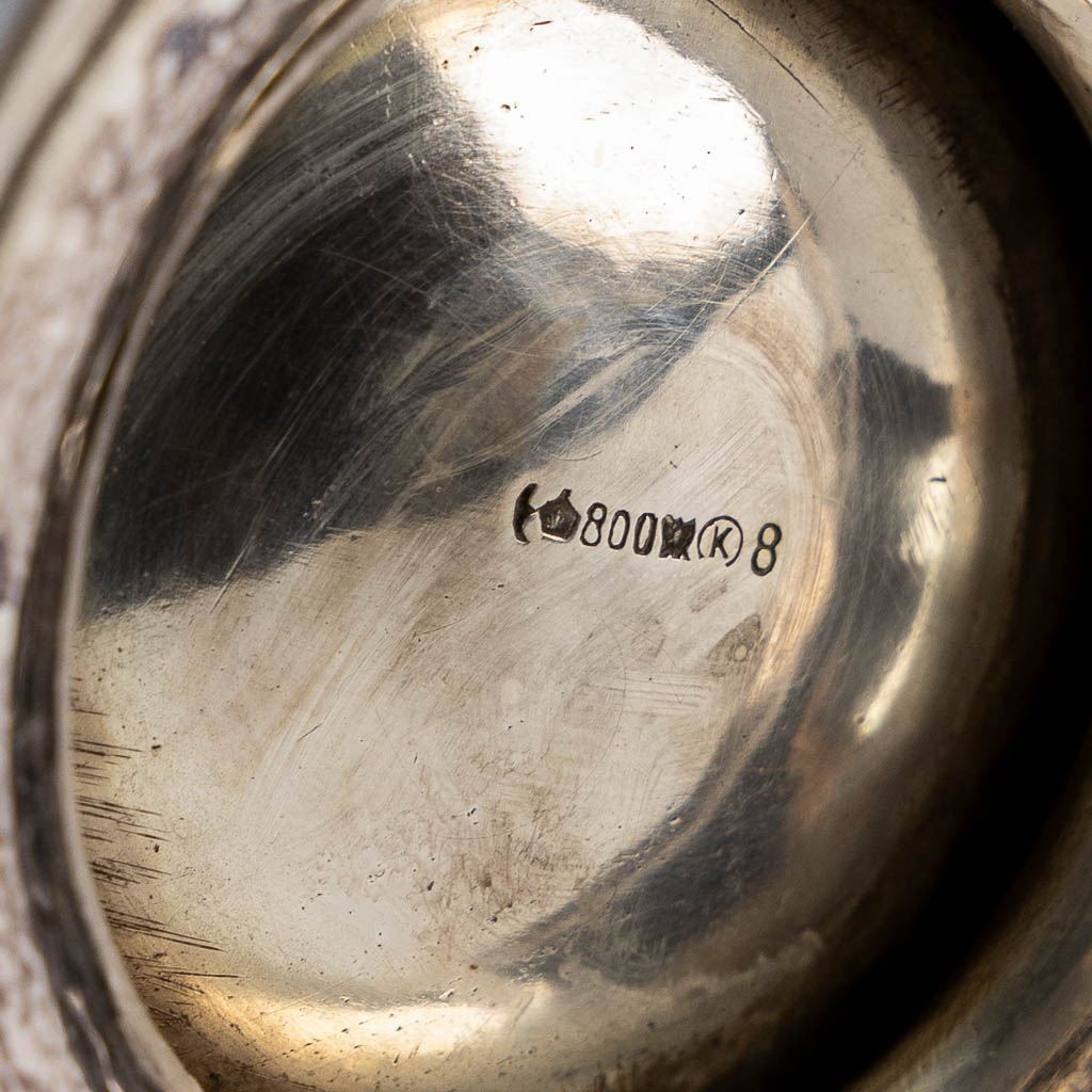 A three-piece silver coffee service, Louis XVI style, Germany, 800/1000. 1,115kg. 