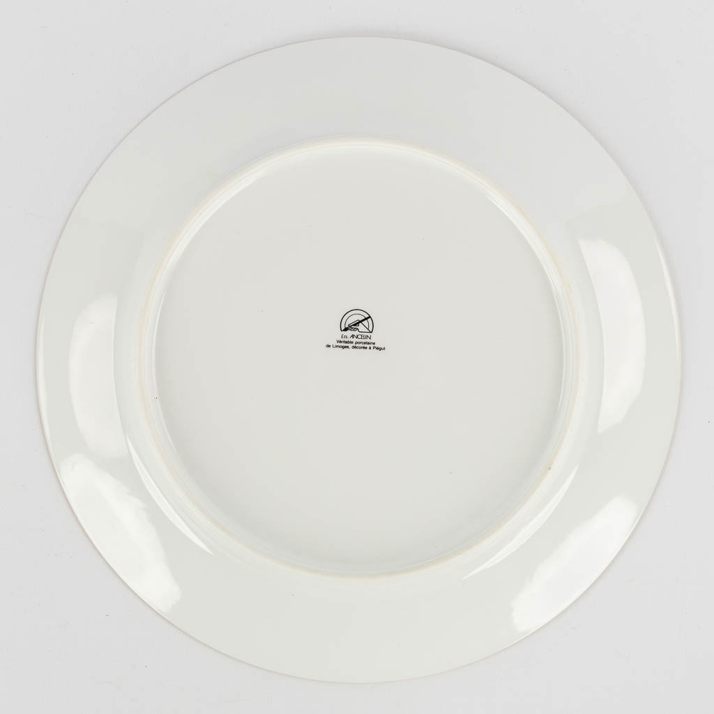 Limoges, a collection of fish-, cheese- and dinner plates. Porcelain. (L:31 x W:39 cm)