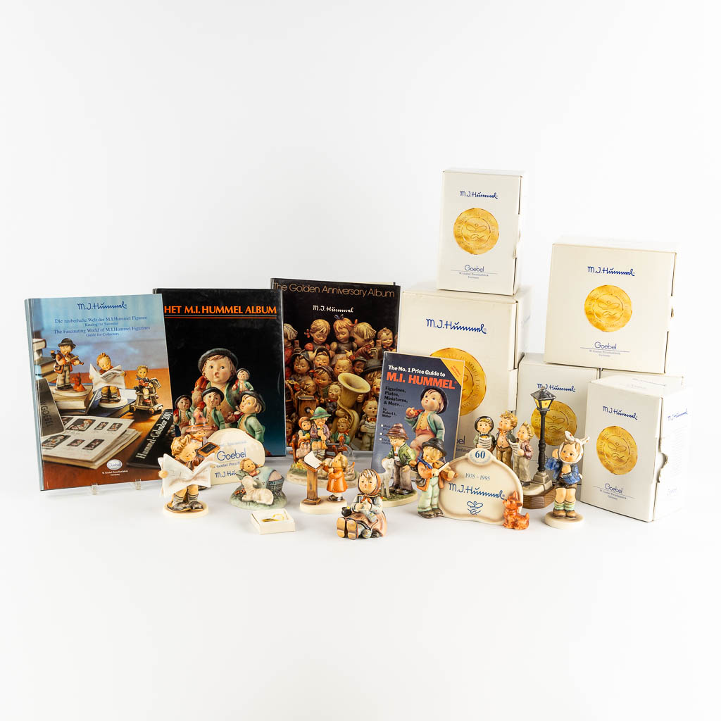 Hummel, 9 figurines with original boxes and 3 books + catalogs. (H:18 cm)