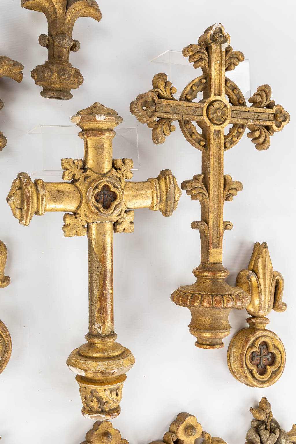 A set of antique wood-sculptured and patinated crucifixes and finials, thick silver-thread embroideries. 19th C. (W:37 x H:69 cm