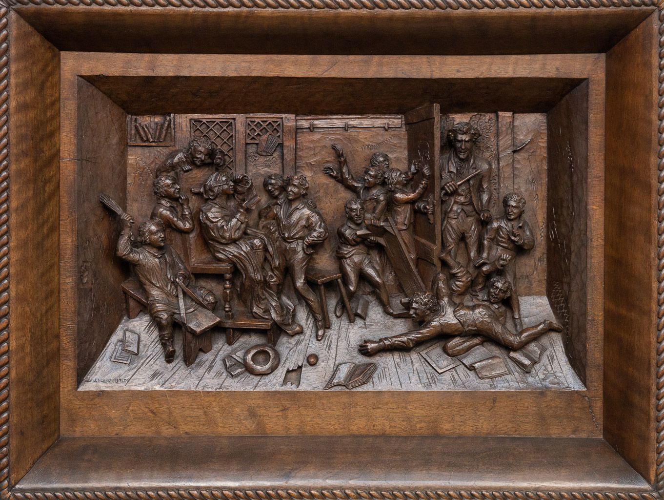 Een houtsculptuur in relief, J.M. Kirkbride. 