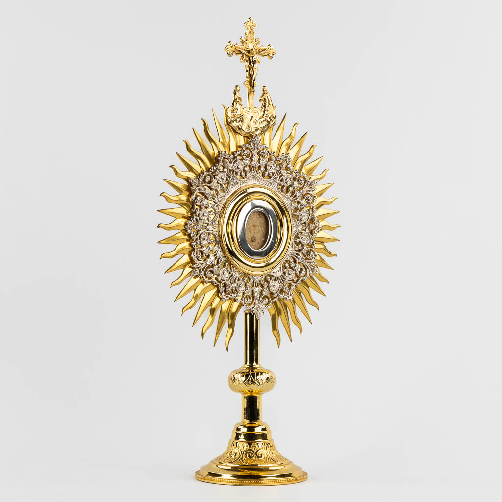 A sunburst monstrance with a multi-theca 