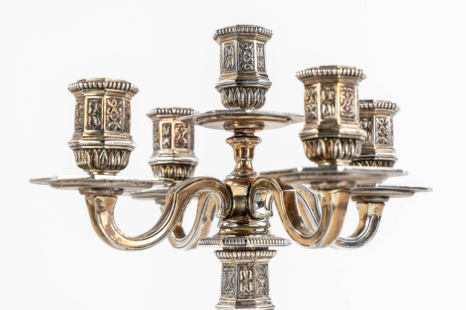 Christofle 'Duperier' a large candelabra, added are a pair of Candlesticks in Louis XVI style.