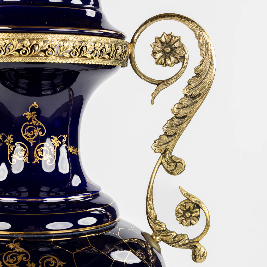 A decorative cobalt blue vase mounted with bronze, in the style of Sèvres. 20th C. (L:30 x W:42 x H:110 cm)