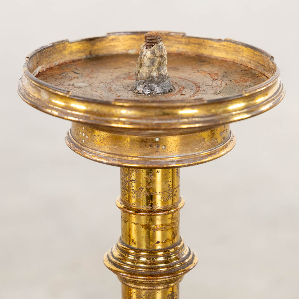 A set of six candlesticks, bronze standing on lions, Gothic Revival style. (L:17 x W:17 x H:45 cm)