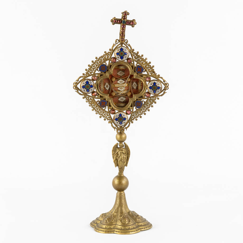 A reliquary monstrance with 6 relics, spelter and cloisonné enamel. 1901. (W:16 x H:36 cm)