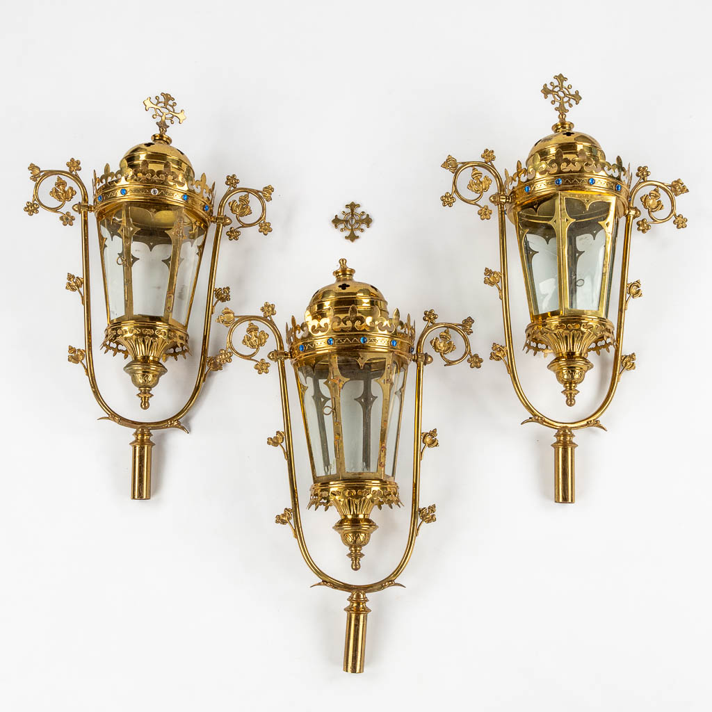 Three Processional lanterns, brass finished with cabochons, Gothic Revival. (W:48 x H:82 cm)