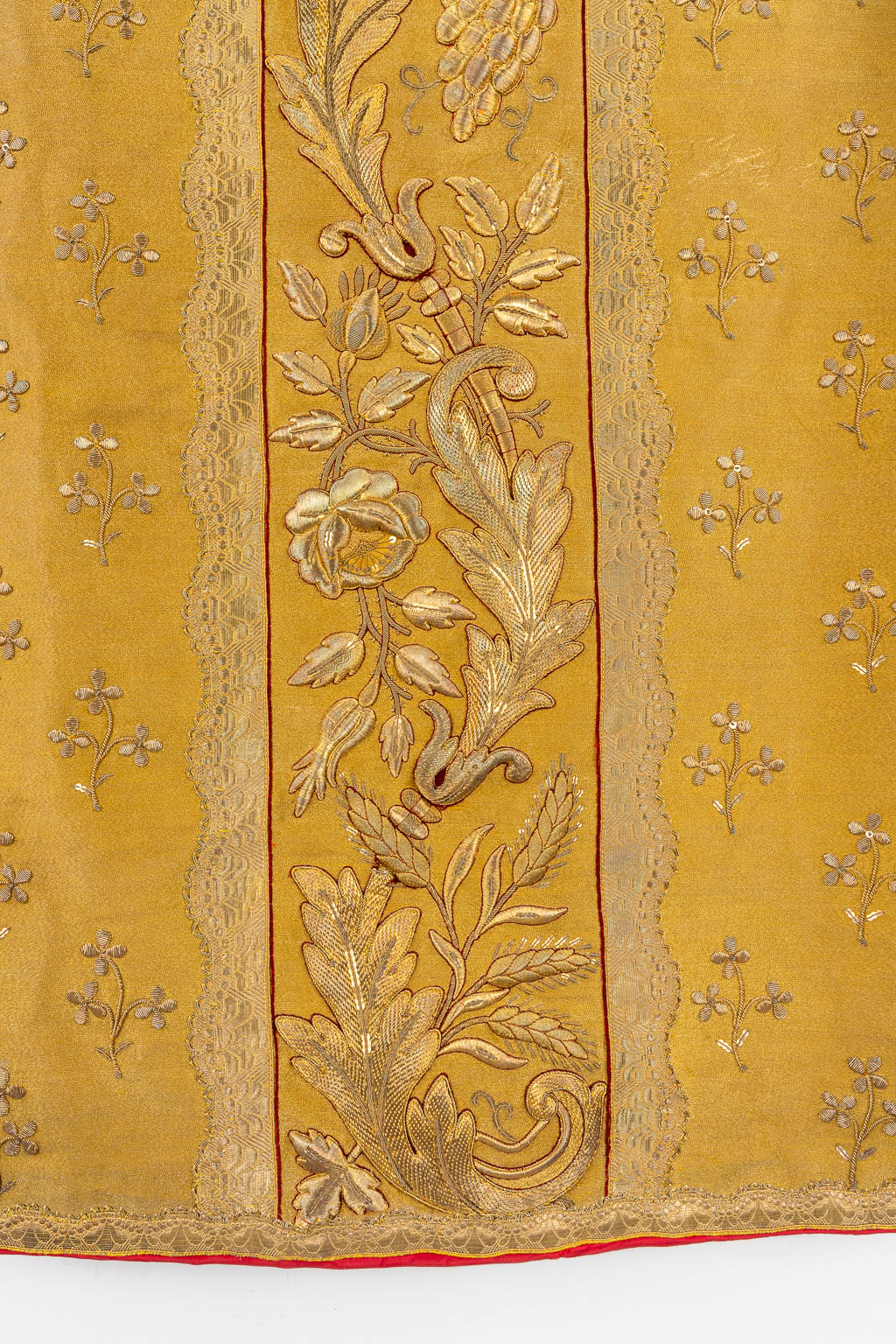 Three Roman Chasubles, Two stola, two pillows and a Humeral Veil. Thick gold thread embroideries.