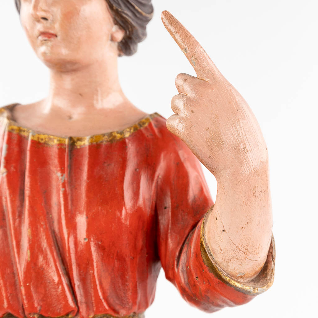 An antique wood-sculptured and polychrome figurine of a noble lady. 18th/19th C. (L: 20 x W: 25 x H: 60 cm)