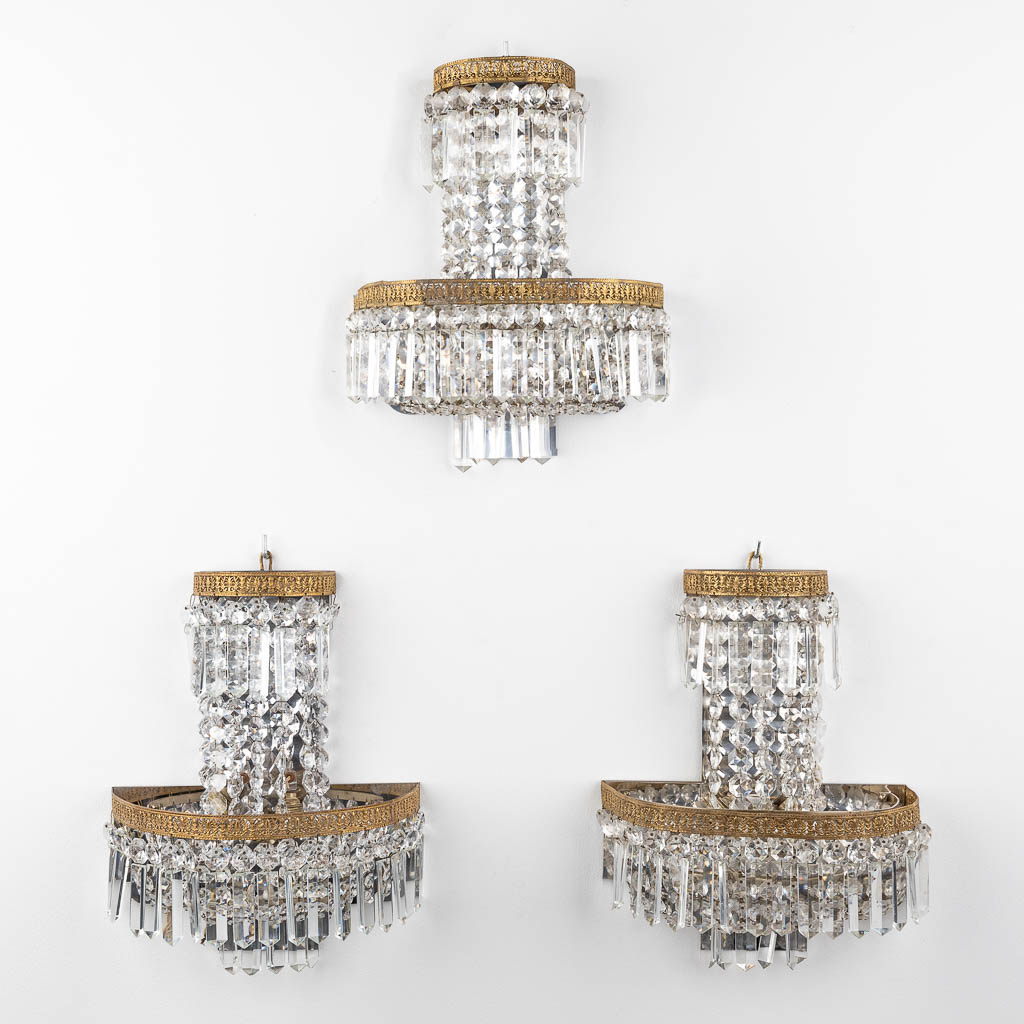 Three wall lamps, glass and metal. 20th C. (D:14 x W:29 x H:37 cm)