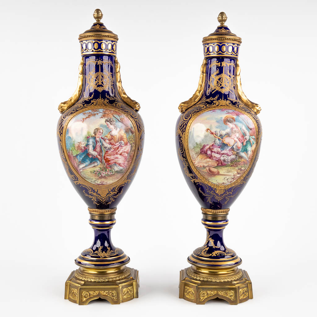 A pair of hand-painted and cobalt blue vases, J. Tiélès, Paris, France. (H:67 x D:20 cm)