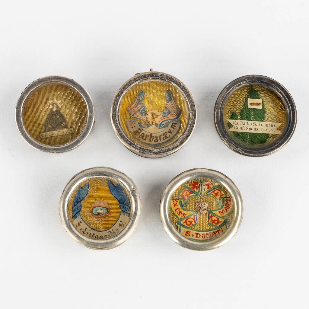 Five sealed theca with relics for saints. 