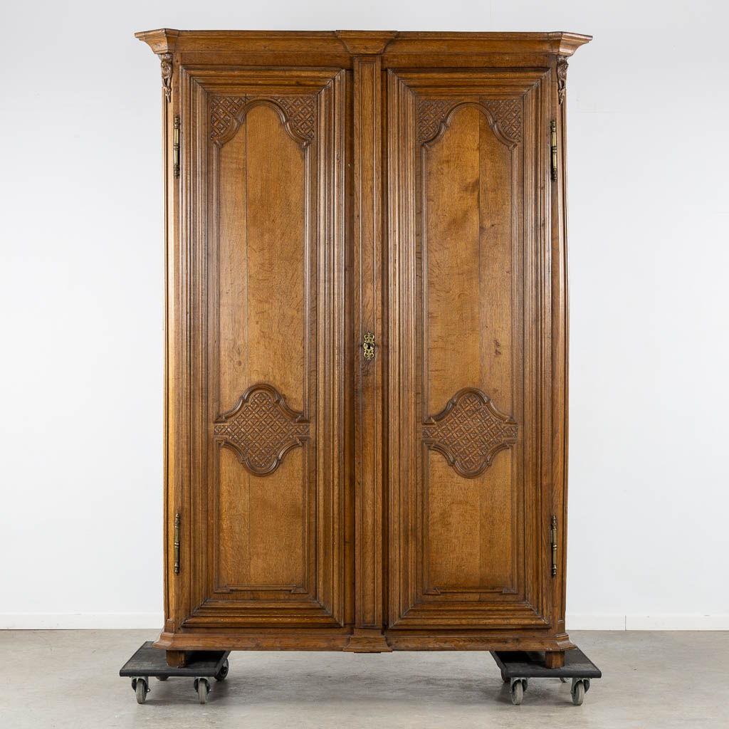 A two-door wardrobe, Louis XIV, 18th C. (L:63 x W:168 x H:235 cm)