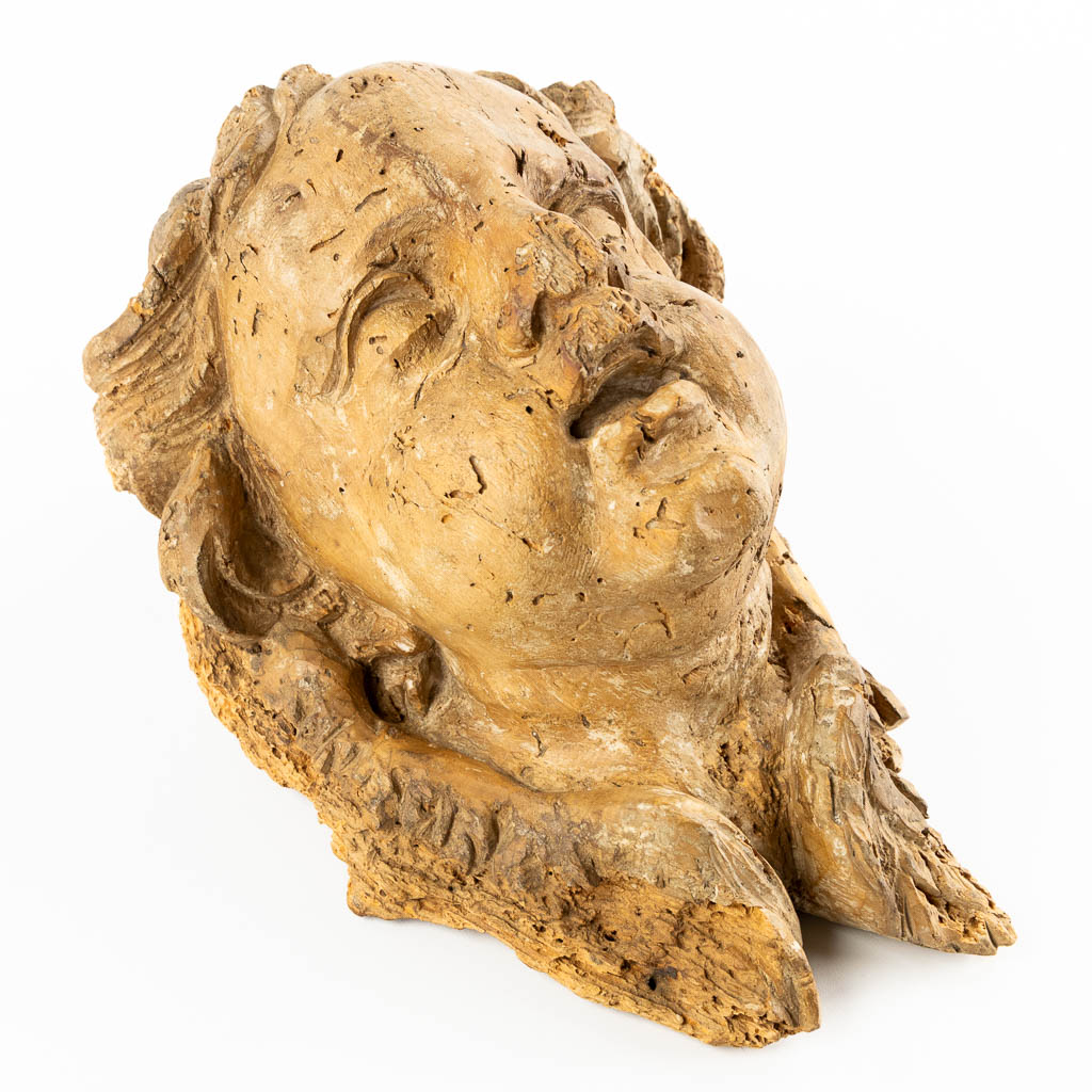 Head of an angel, an antique wood sculpture. 18th C. (L:18 x W:20 x H:30 cm)