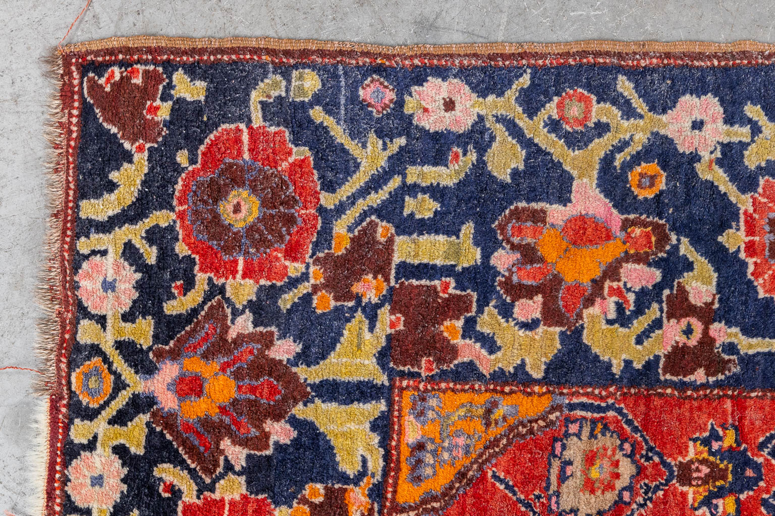 An Oriental hand-made carpet, dated 1939.. (W:124 x H:196 cm)