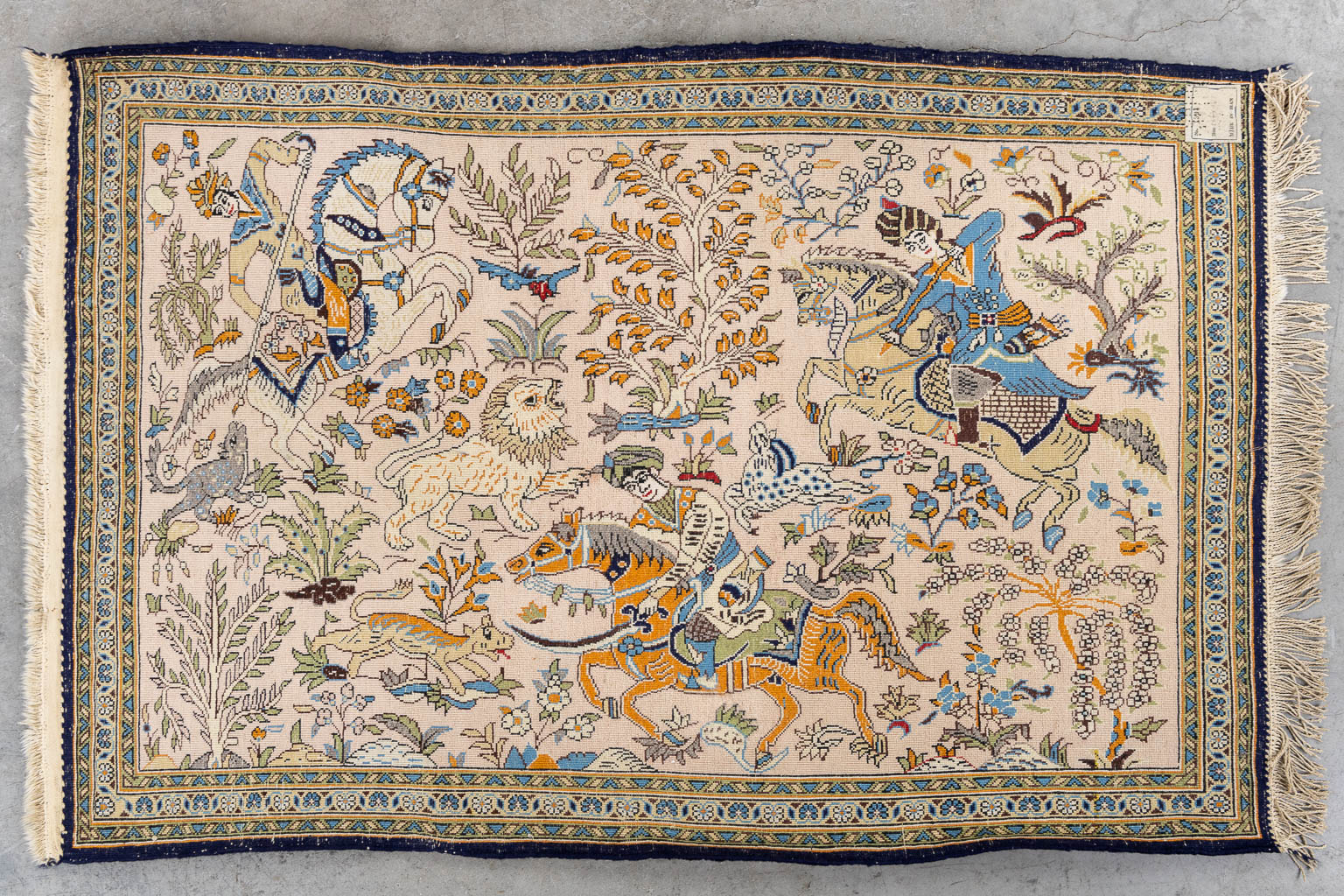 An Iranian hand-made carpet with equestrian hunting decor, Isphahan/Isfahan. (L:82 x W:120 cm)