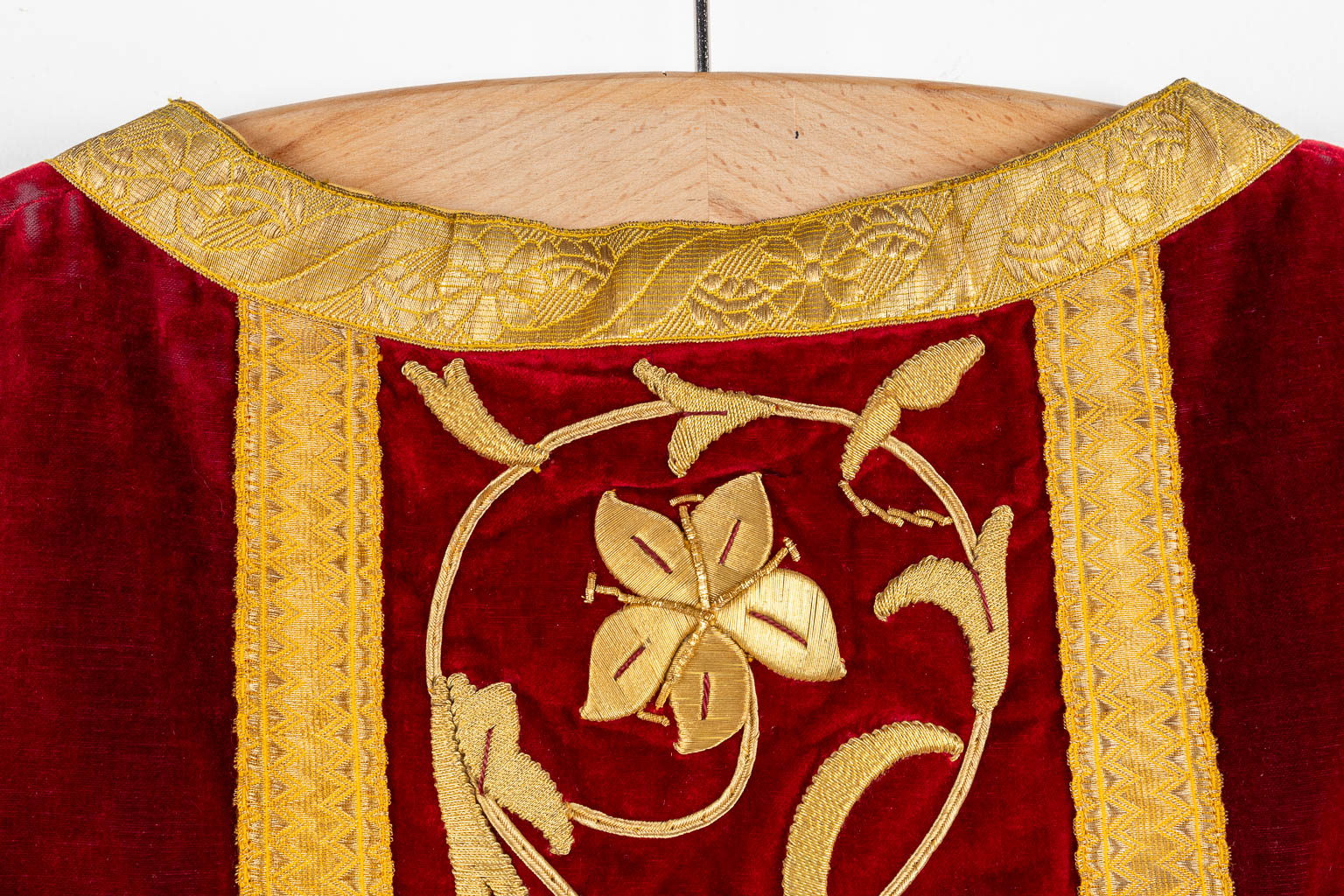 Three Roman Chasubles, Two stola, two pillows and a Humeral Veil. Thick gold thread embroideries.