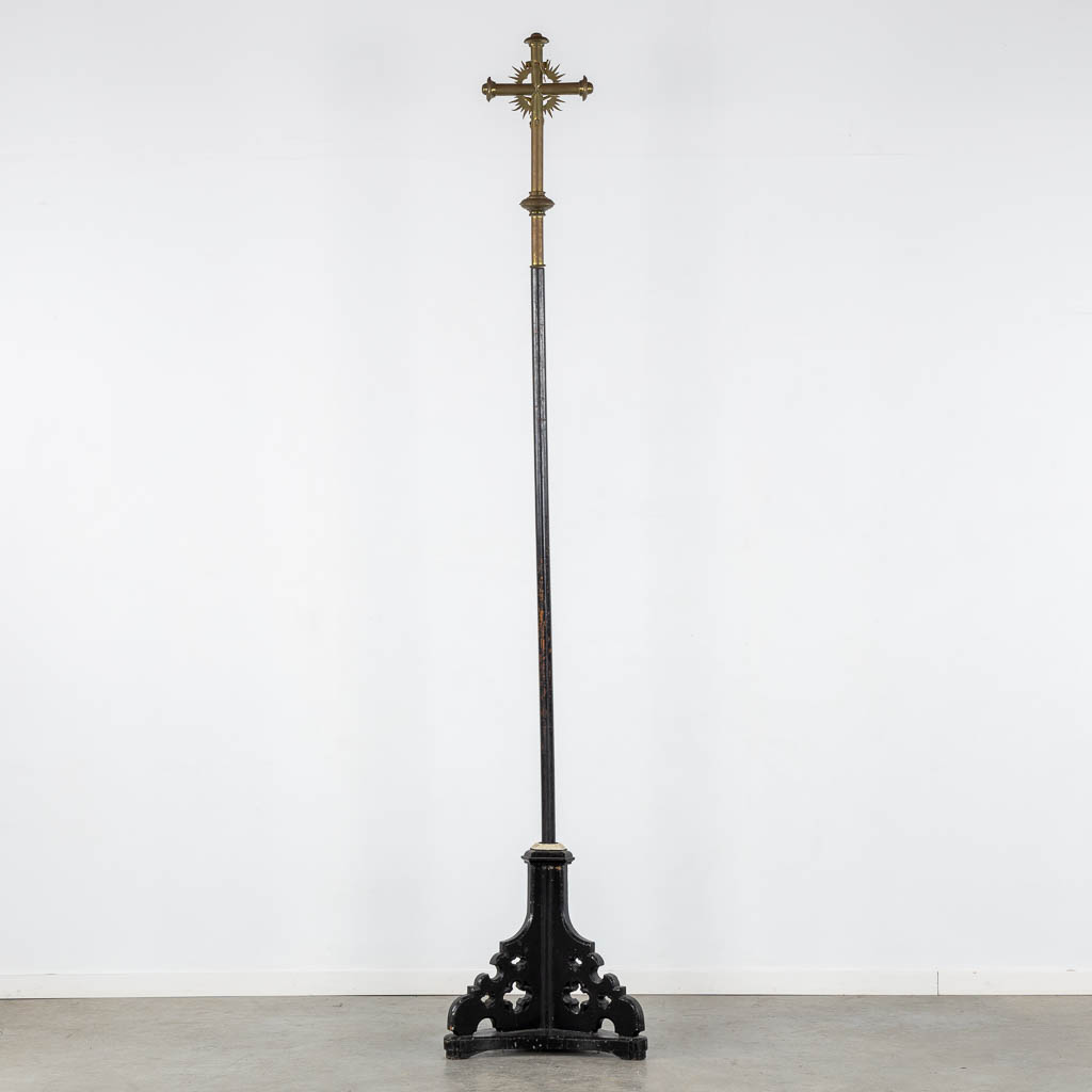 Four Processional crucifixes with their stands. Silver-plated metal and Brass. (H:265 cm)